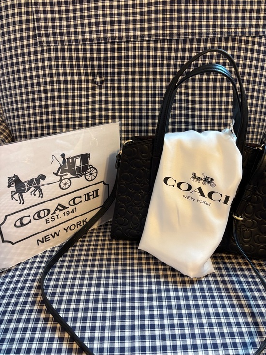 Coach Handbags - Coach Charlie carry  all Black Embossed leather with branded  Dust Bag